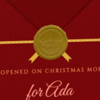 The golden wax seal on the ribbon of the red envelope