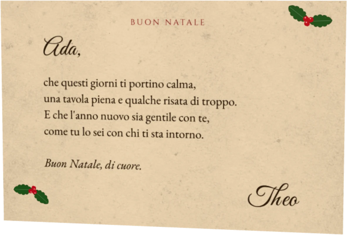 La lettera di auguri di Theo per Ada, su carta antica con l'agrifoglio negli angoli