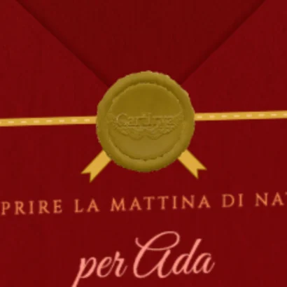 Il sigillo di ceralacca d'oro sul nastro della busta rossa